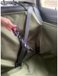 Fastening the car seatbelt in a dog seat cover with side flaps