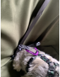 Fastening the car seatbelt in a dog seat cover with side flaps