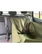 Fastening the car seatbelt in a dog seat cover with side flaps